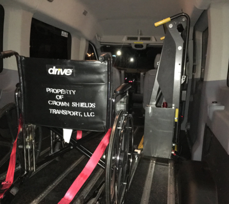 A wheelchair is positioned inside a vehicle