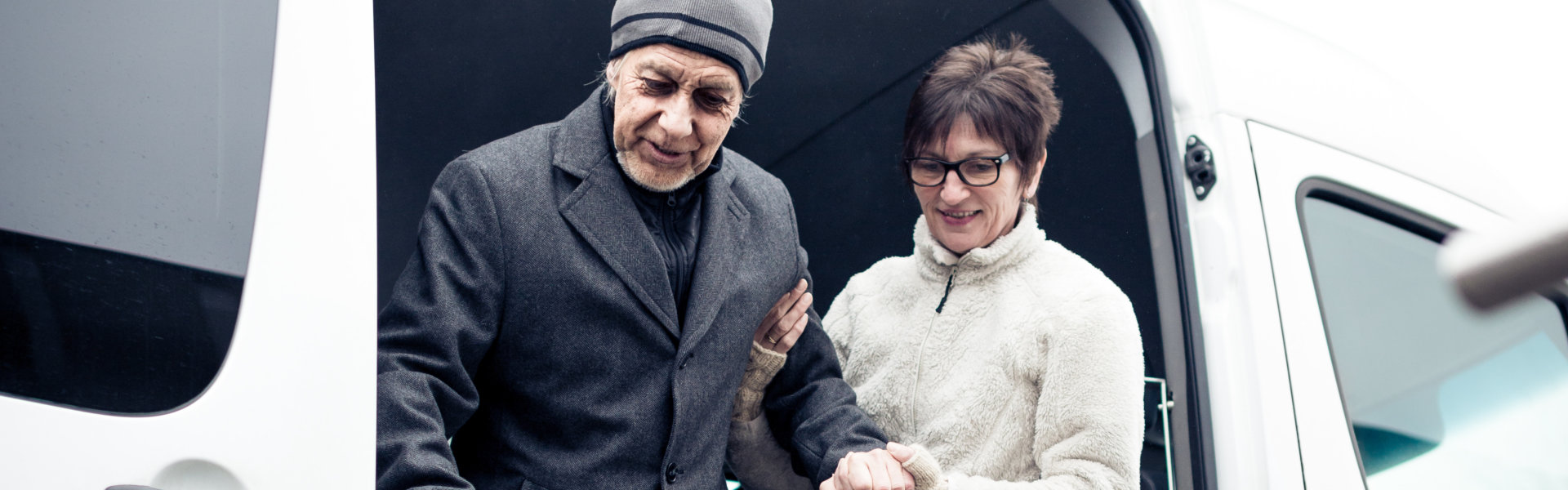 woman assessing the elderly man